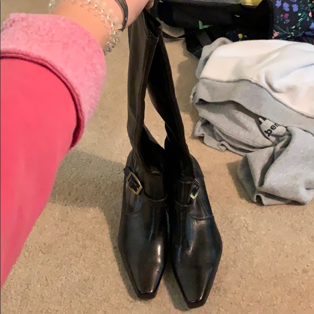 dark brown boots with gold buckle